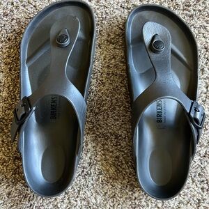 Birkenstock Black Sandals with Toe Loop and Adjustable Strap